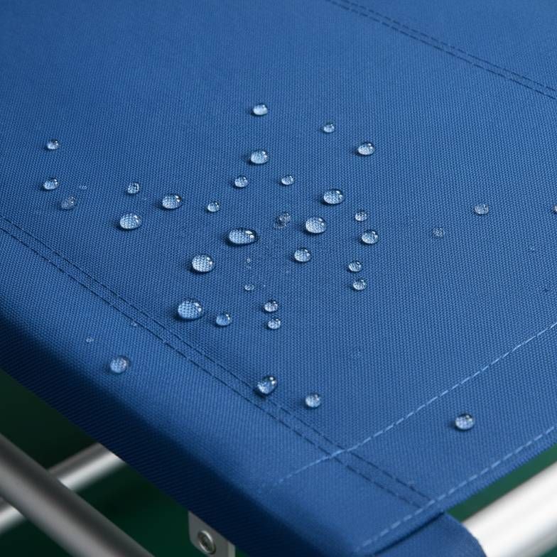 Liquid beading on the waterproof fabric of a portable folding stretcher