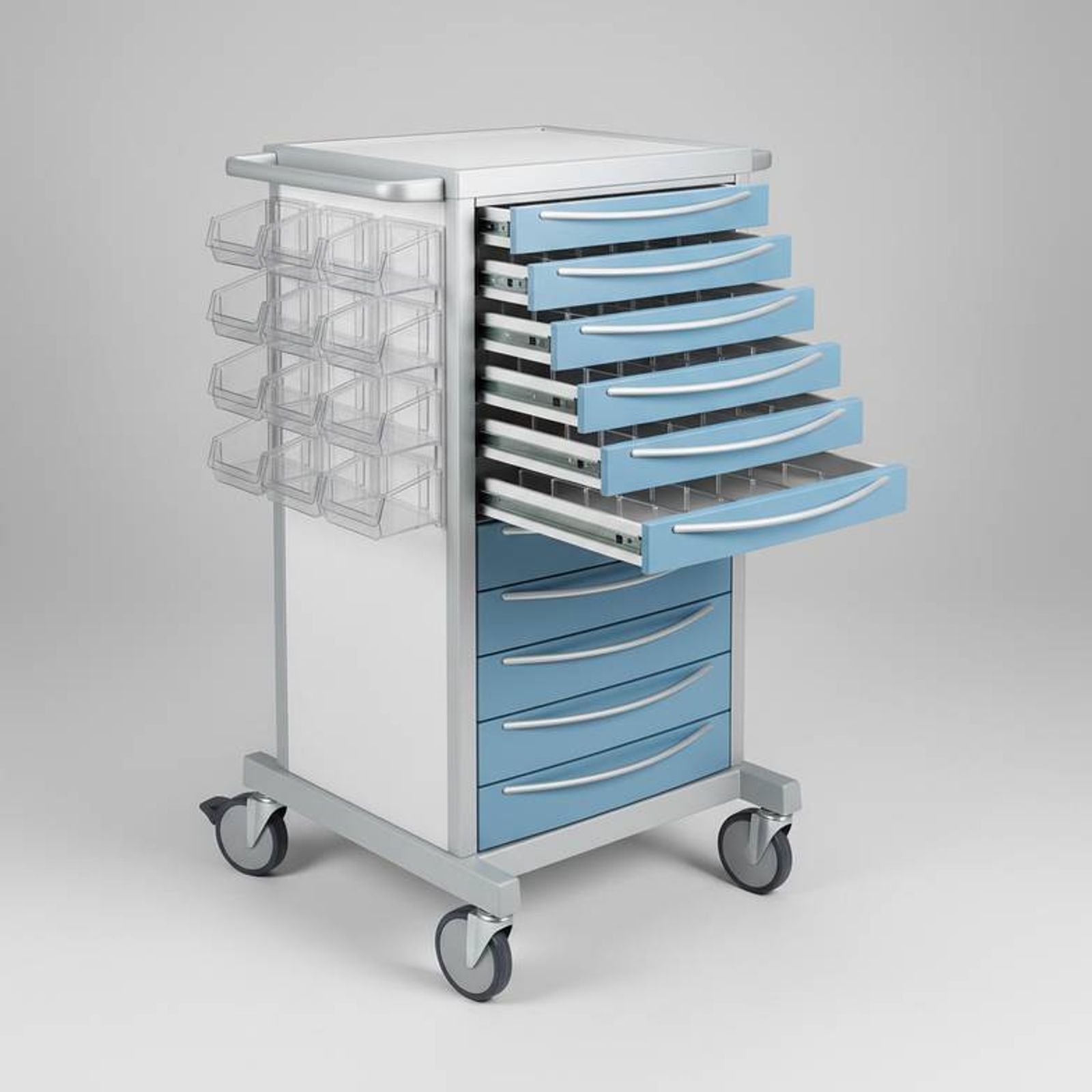 Anesthesia trolley with many small drawers and tilting bins for medication