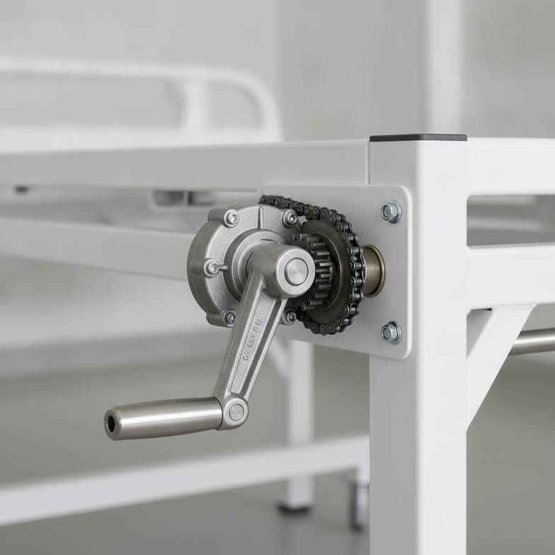 A close-up of a robust manual crank mechanism on a hospital bed, suitable for African rural clinic projects.