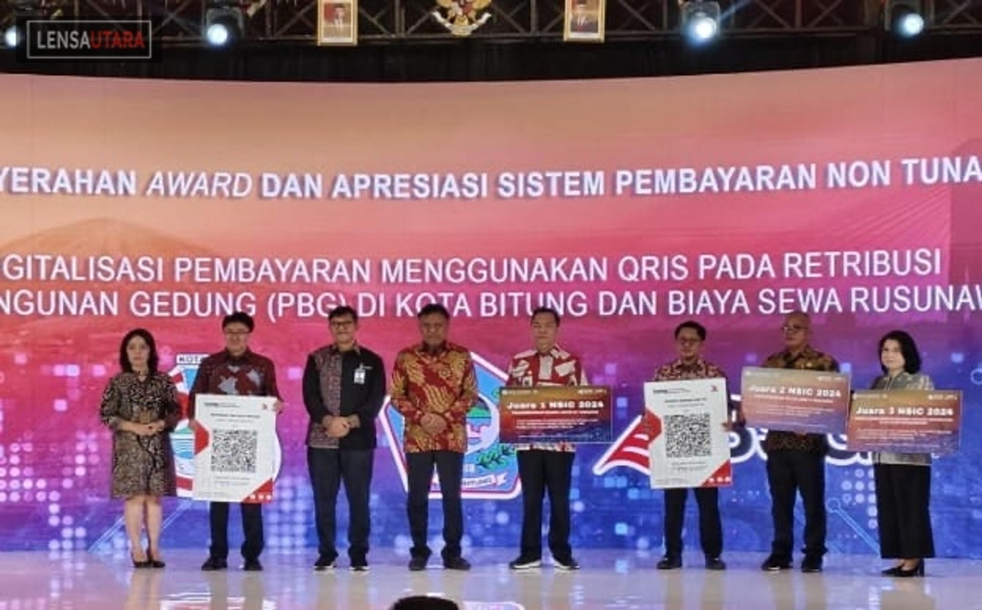 BSG Serahkan QRIS untuk Manado dan Bitung pada North Sulawesi Investment Forum 2024