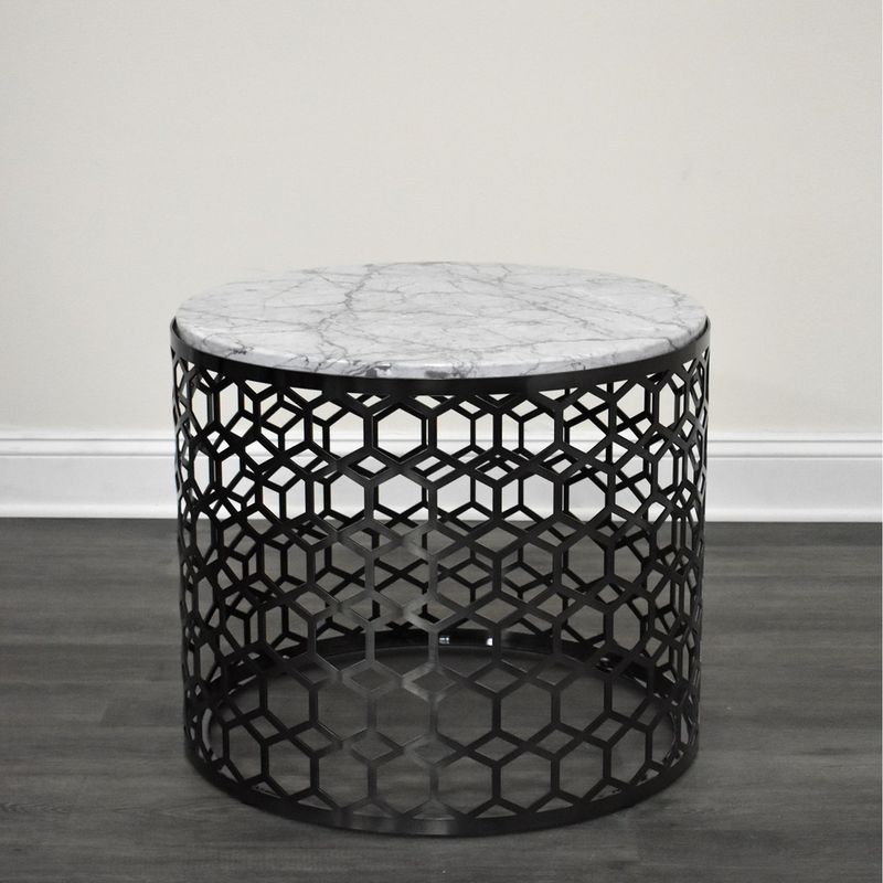 This beautiful group of tables were manufactured right here in the USA.

Finish: Brushed Smokey Translucent Black
Top: White Carrera Marble

RF-T-0100-24-20…