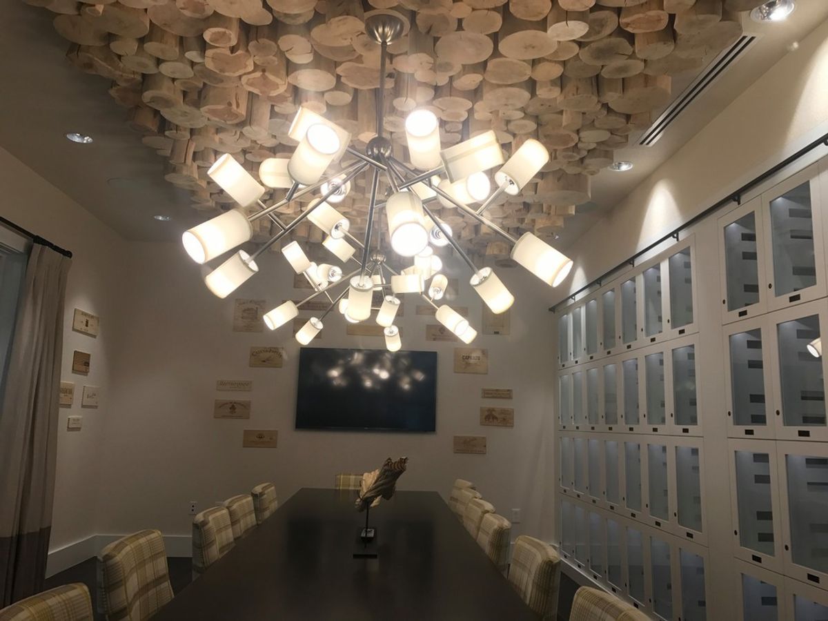 This unique install at Trilogy Lake Norman Clubhouse features many different materials. Custom design in collaboration with Design Lines, Inc.