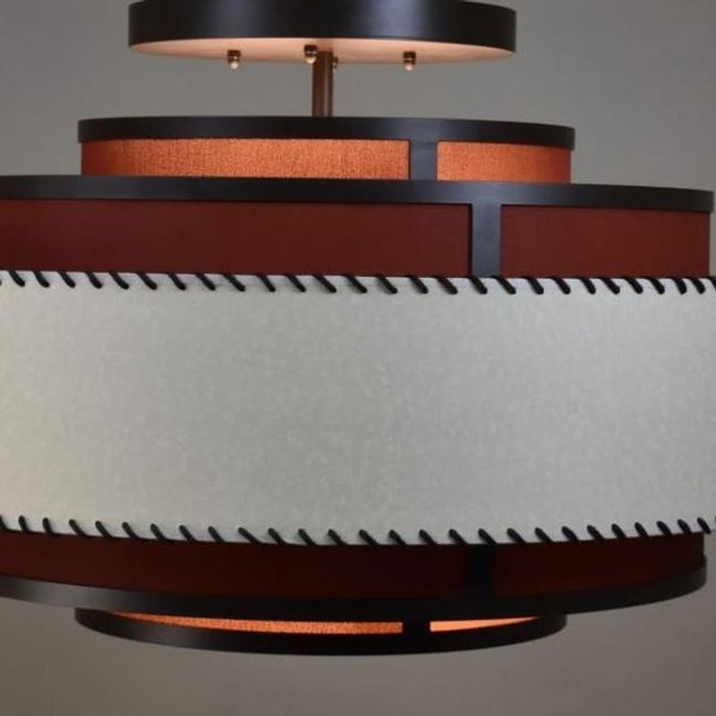 New Pendant
RL-3-1473
36” Dia. x 18” H x 22” OAH
Cappuccino Powder Coat
Outer Shade-Marble Beige with Stitching
Inner Shades-SW Brick Paver on Linen 
Frosted…