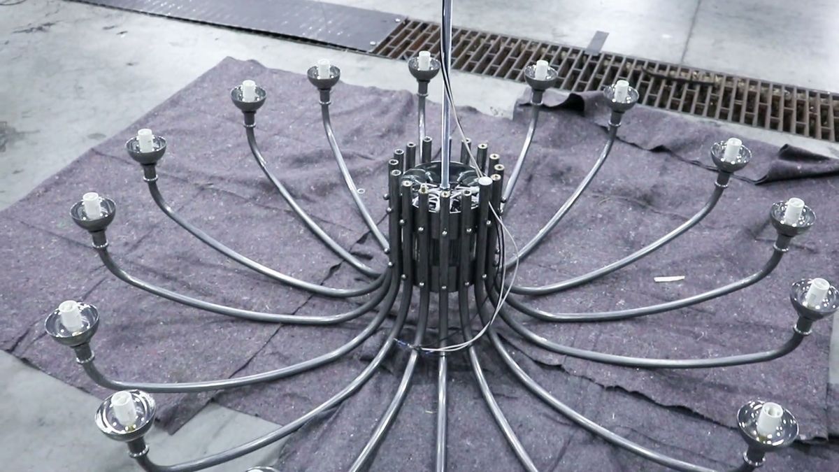 Locanda chandelier fully assembled and laid out for quality inspection