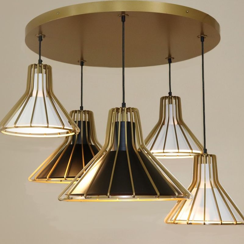 Custom made pendant built in Roanoke, VA, USA. Featuring Bright Gold Powder Coat on the canopy and outer ribbed frames, Black Star Powder Coat on the large i…