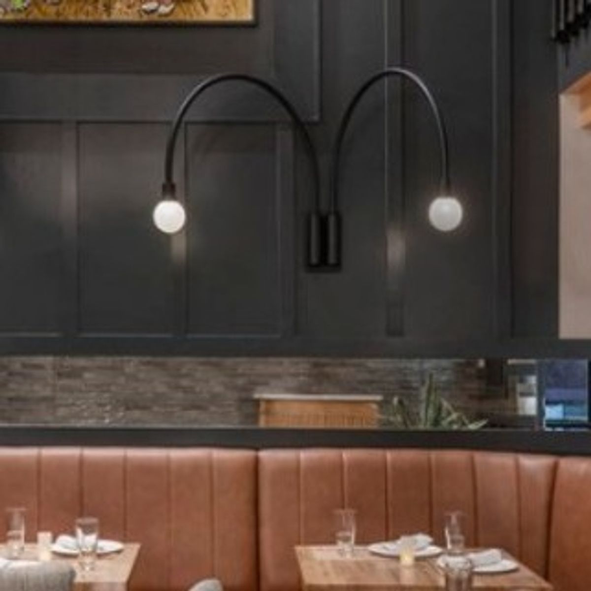 Step inside Strive Kitchen & Bar, where our massive chandelier and sleek wall sconces bring dramatic lighting and elevated style to every corner of the space…