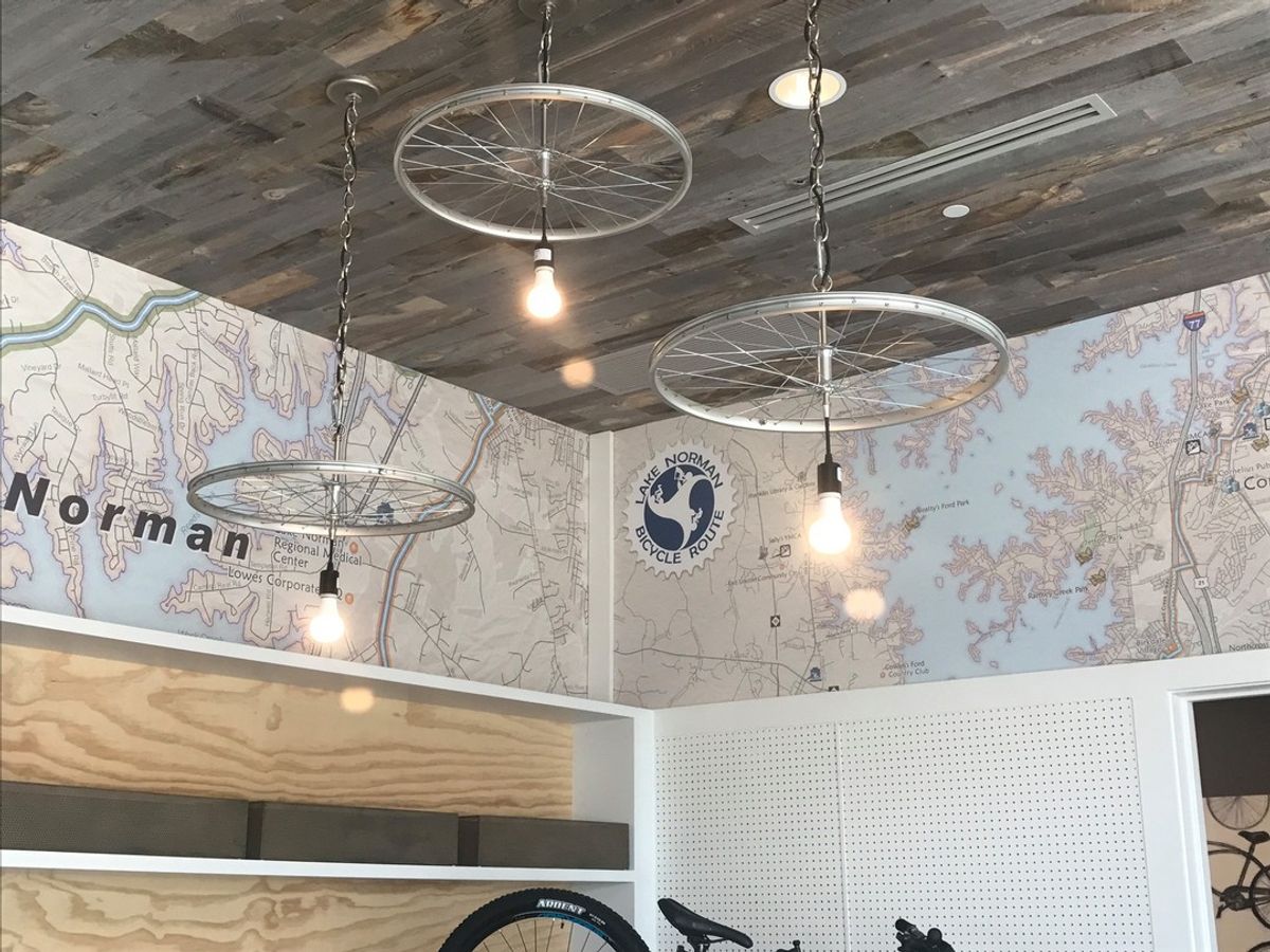 This unique install at Trilogy Lake Norman Clubhouse features many different materials. Custom design in collaboration with Design Lines, Inc.