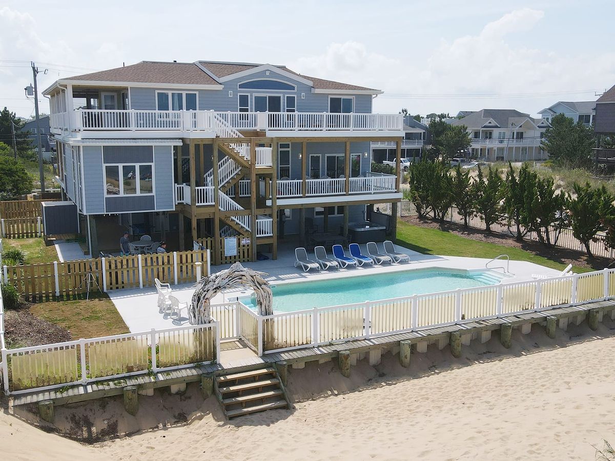 Expansive vacation property with multiple decks, a private pool, and plenty of space for entertaining. A top choice for big family reunions or beachside celebrations.