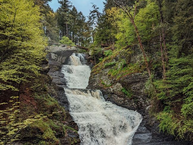 The tall and dramatic Raymondskill Falls cascading down multiple rock tiers in the Poconos.