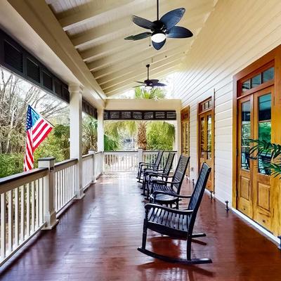 Front porch with rocking chairs at a Wild Dunes vacation rental on Isle of Palms.