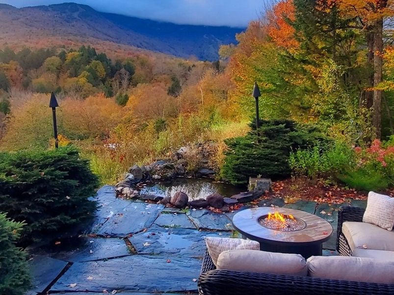 Vermont Vacation Rental Fire pit Area Overlooking Mountains in the Fall