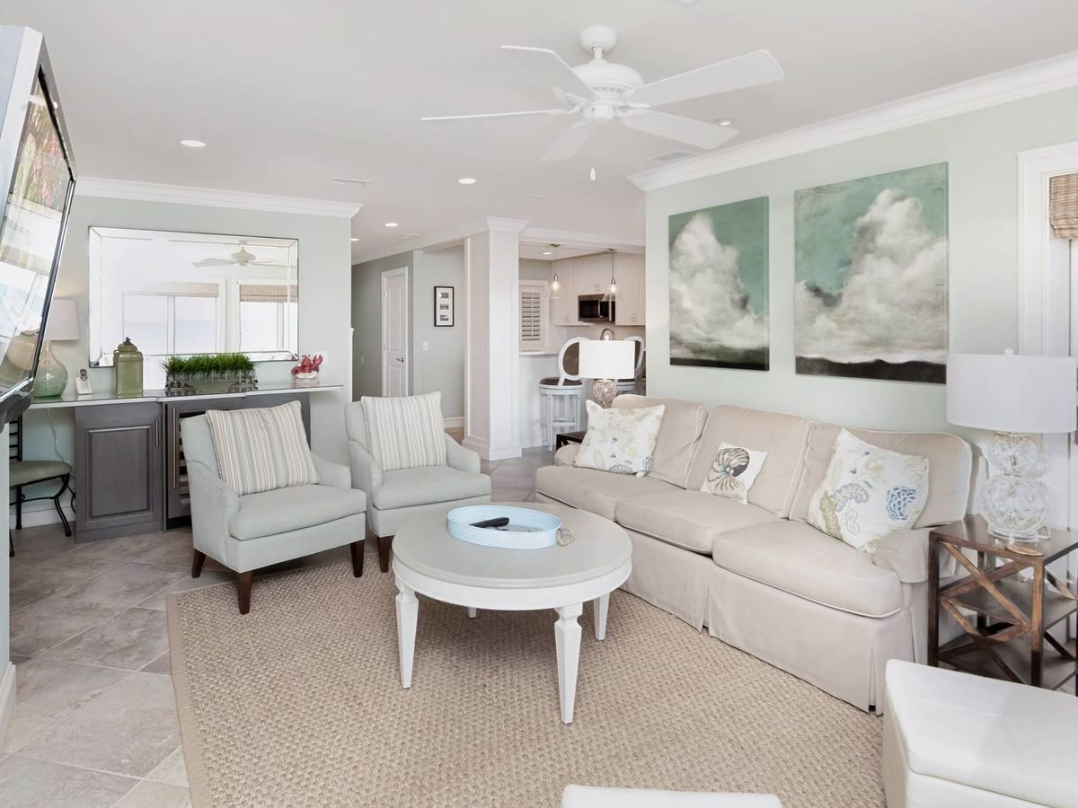 This beachfront villa offers open living spaces with modern furnishings and an inviting coastal design. Enjoy the ocean views from the bright living area or relax on the balcony with the sea breeze. A perfect balance of comfort and style for your vacation.