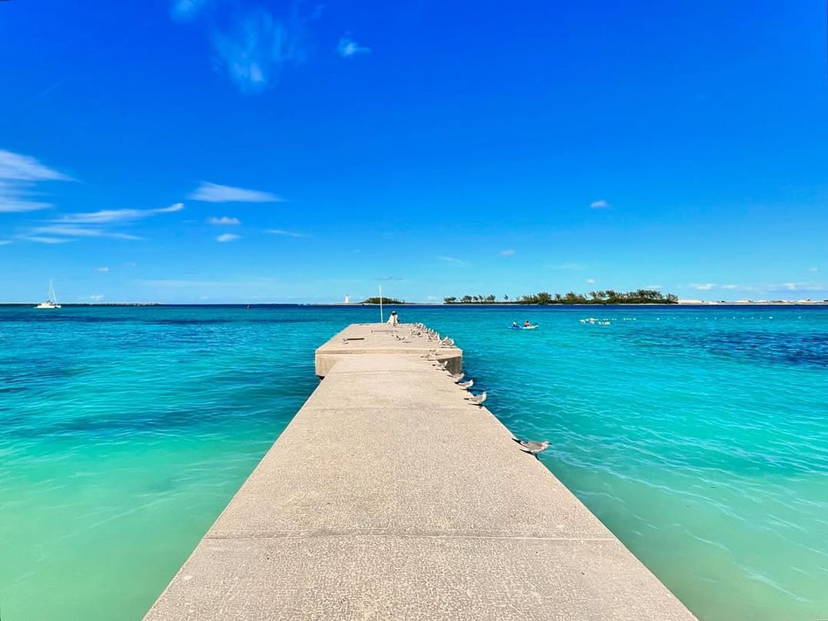 Junkanoo Beach in Nassau shows off soft sand, turquoise waves, and a lively atmosphere. A popular spot for both locals and visitors to relax by the water and soak up the island vibe.