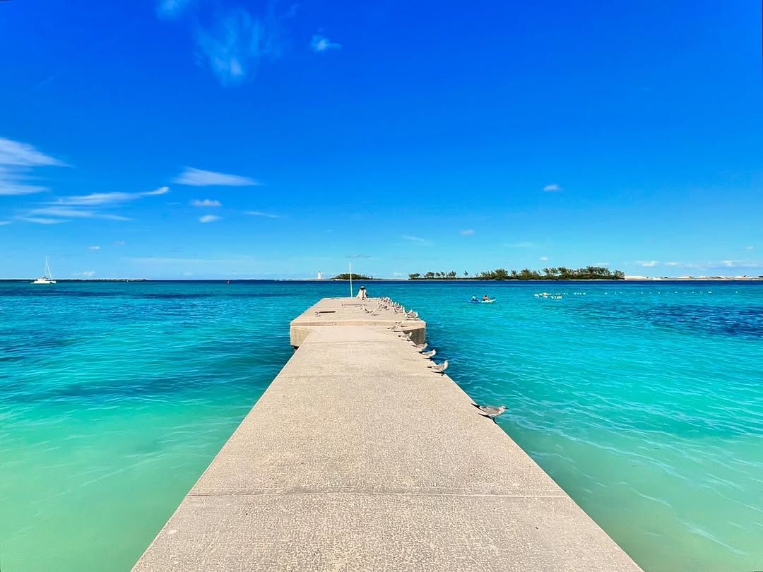 Junkanoo Beach in Nassau shows off soft sand, turquoise waves, and a lively atmosphere. A popular spot for both locals and visitors to relax by the water and soak up the island vibe.