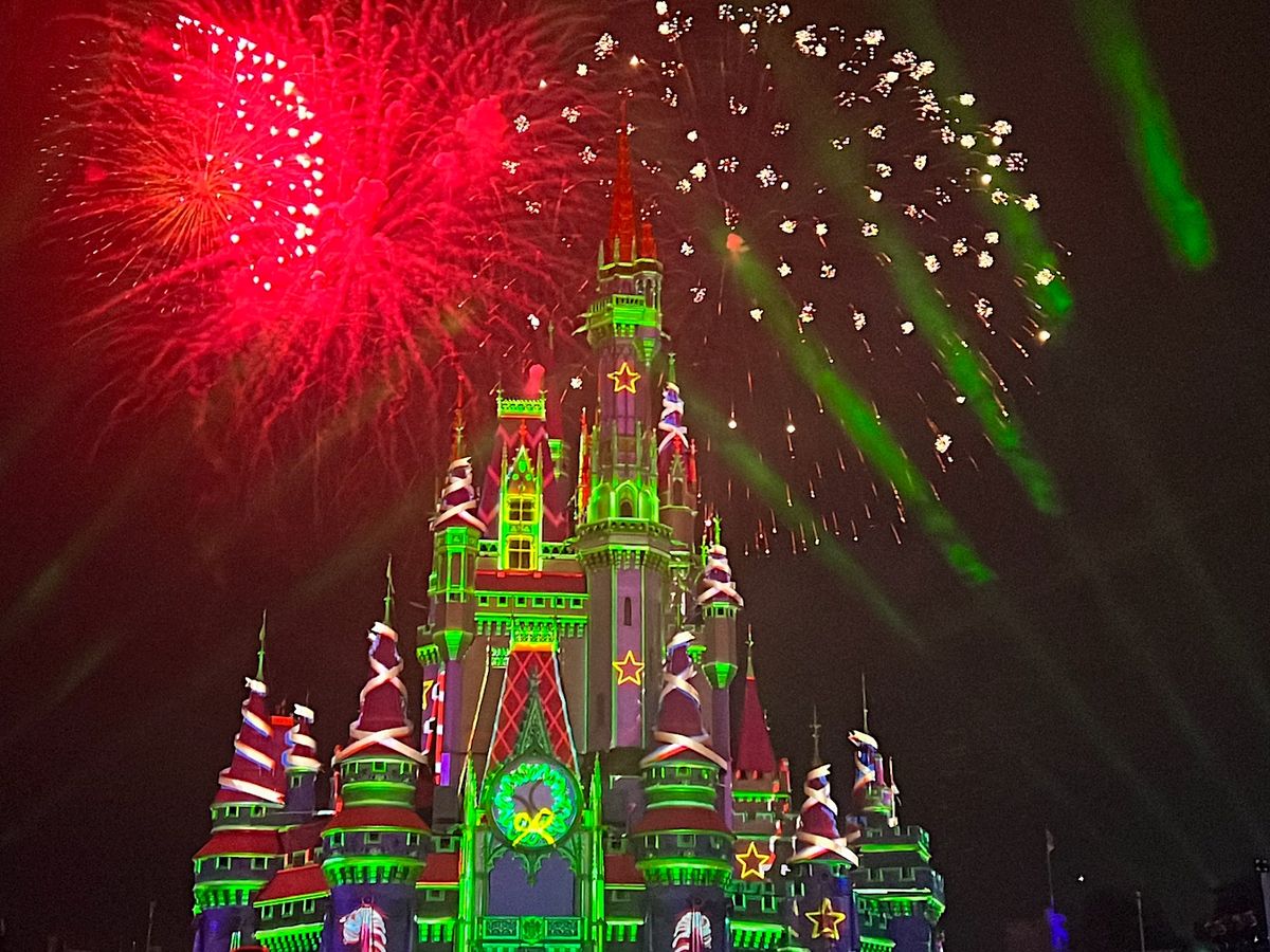 View of Red and Green At Minnies Wonderful Christmastime Fireworks Magic Kingdom