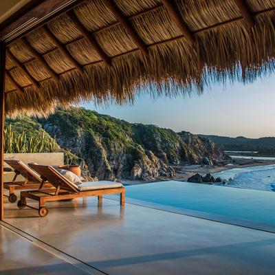 Indoor/outdoor living space overlooking the private pool.