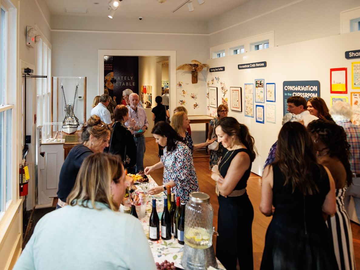 Guests mingle during an evening event at the Coastal Discovery Museum in Hilton Head Island. The museum showcases local art, wildlife, and conservation efforts that celebrate the region’s natural beauty.