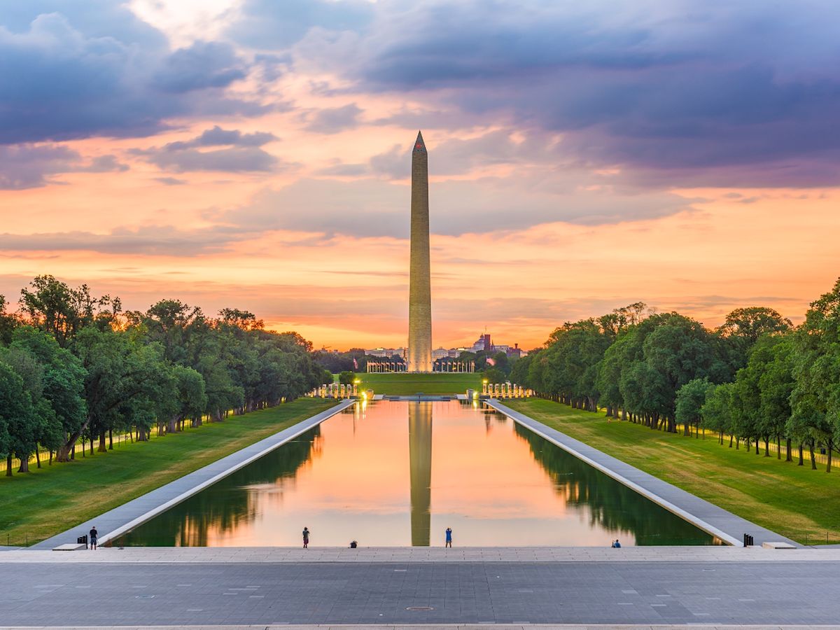 Washington Monument on the reflecting pool in Washington DC at Dawn