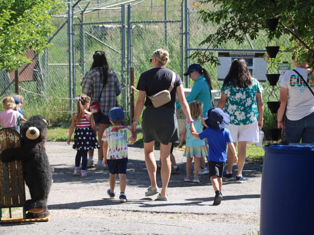 Families explore Yellowstone Wildlife Sanctuary, a safe place to see native animals up close while learning about local wildlife conservation.