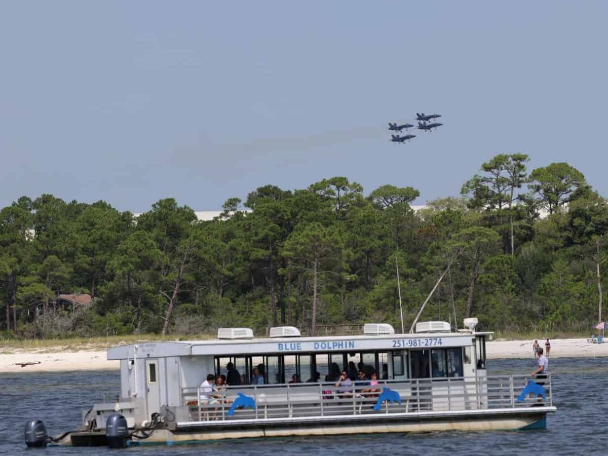 Guests enjoy a scenic ride aboard Blue Dolphin Cruises in Perdido Key, a family-friendly way to spot dolphins and take in the waterfront views.