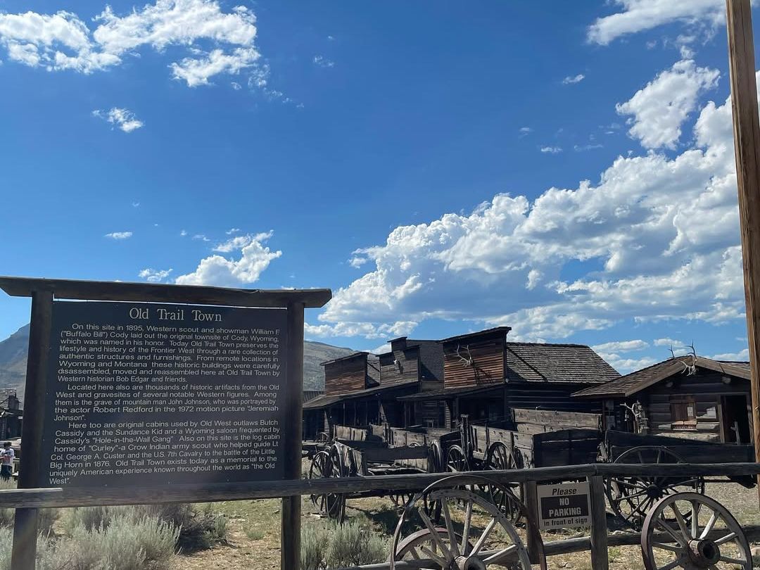 The historic Old Trail Town in Cody, Wyoming, showcases original log cabins, wagons, and artifacts from the Old West. This outdoor museum brings frontier history to life.