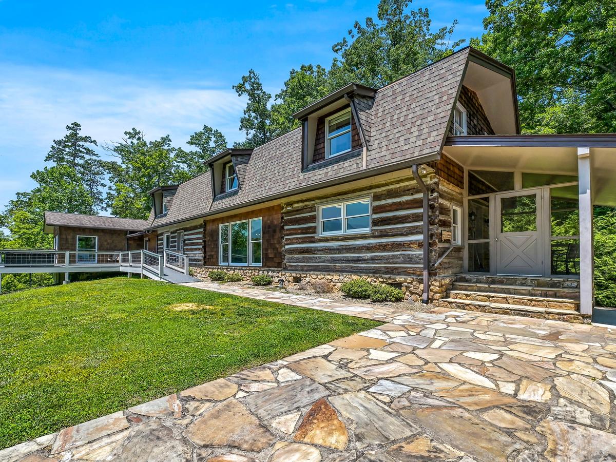 Exterior of cabin lodge rental with ramp leading to front door