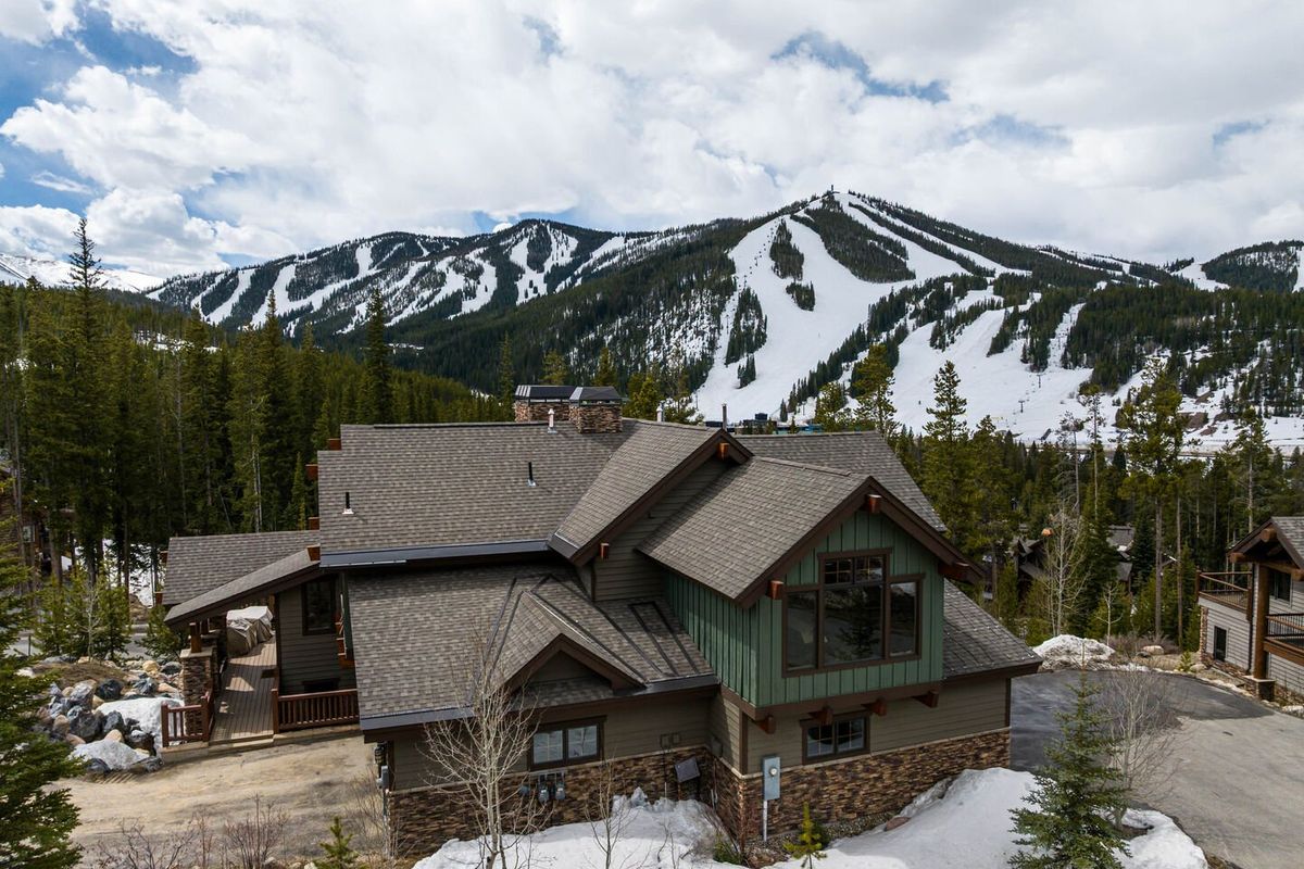 Front of house and mountain