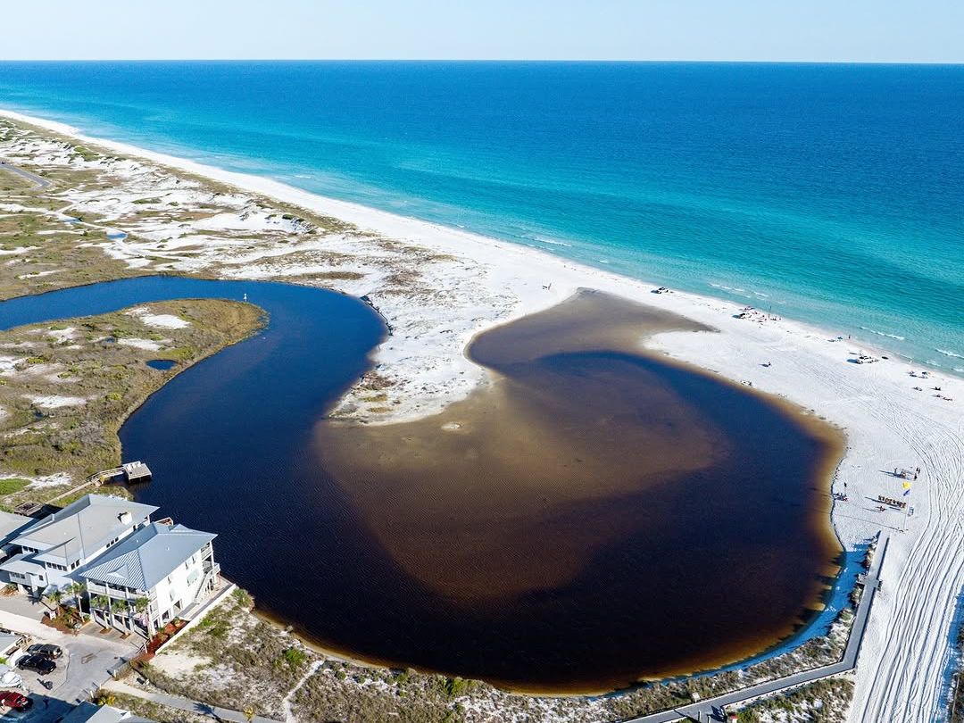 Grayton Beach blends coastal dune lakes with sugar-white sand, making it one of the most scenic spots along 30A. Visitors love its untouched natural beauty, clear waters, and nearby trails for outdoor adventures.