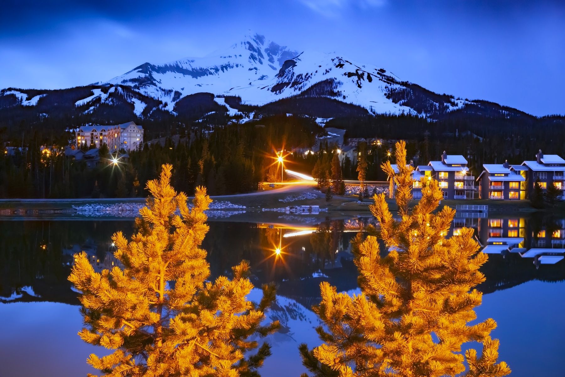 View of lake and Big Sky Resort in Montana on a winter night 