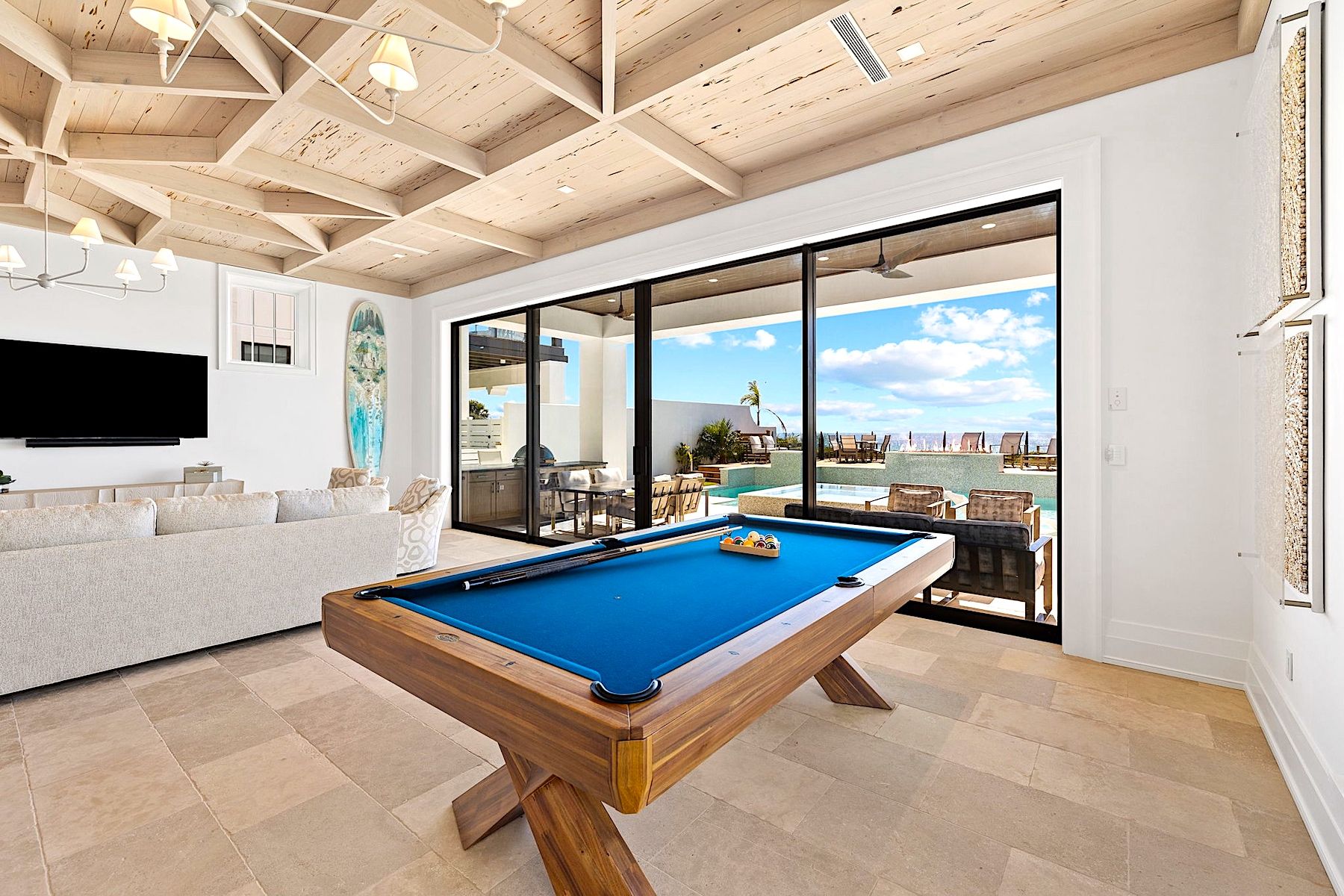 Game Room With Pool Table and View of Pool In A Luxury 30A Vacation Rental