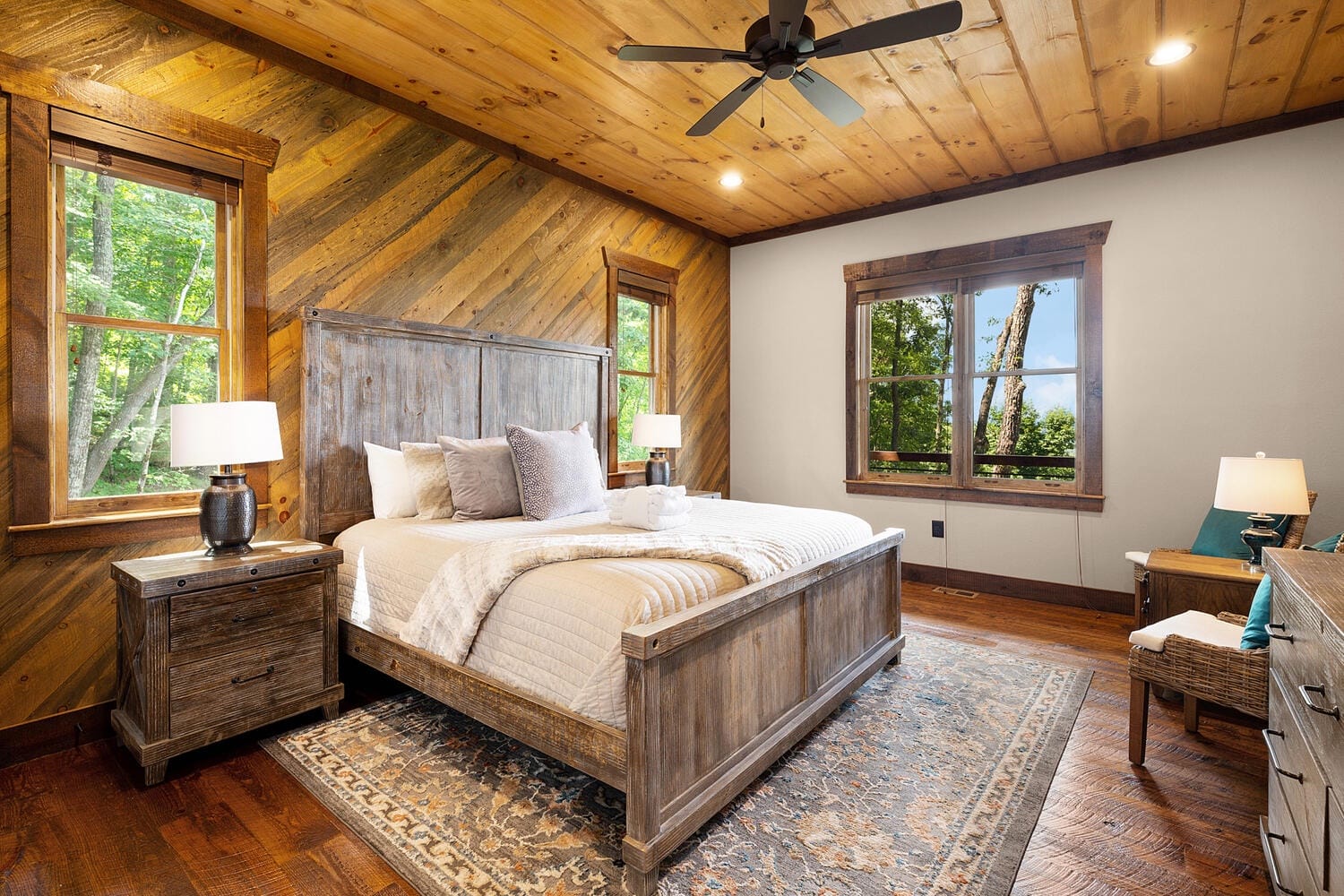 A shallow creek winds through a leafy forest, sunlight dancing across the water. The gentle flow and quiet woods suggest a nature-first way to unplug and feel balanced.