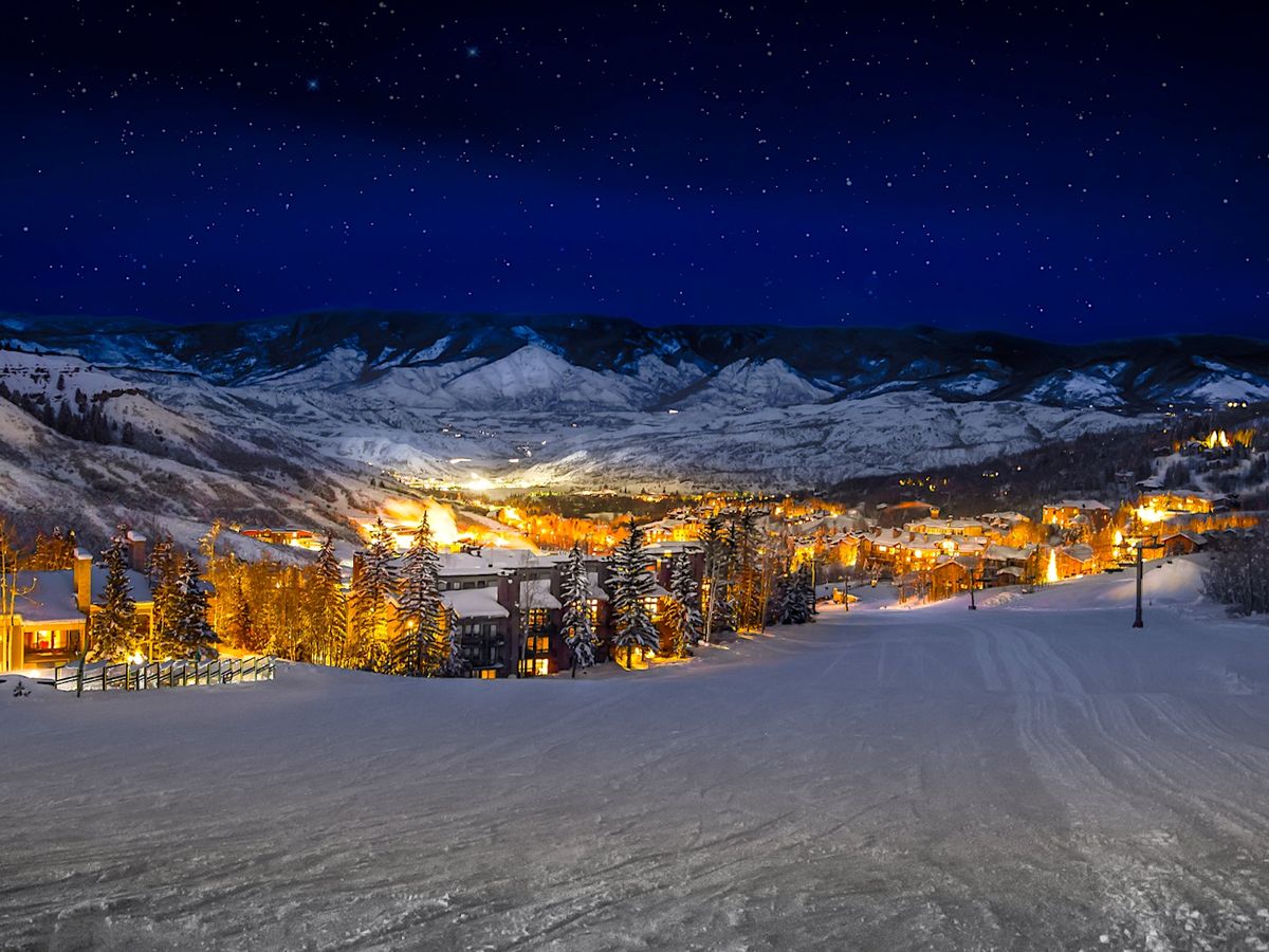 Aerial view of Snowmass Colorado from ski slopes during a winter night