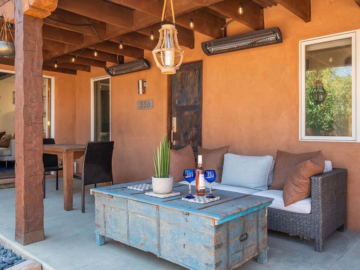 Santa Fe, NM Luxury Vacation Rental Patio with Couch, Lights and Wine