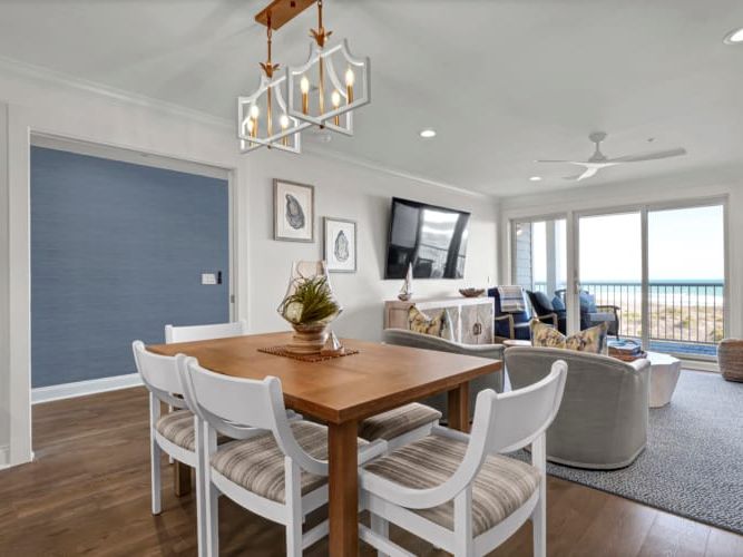 Stylish beach retreat with a relaxed living area, private balcony, and panoramic ocean views. Ideal for small groups, it offers comfort just steps from the shore.