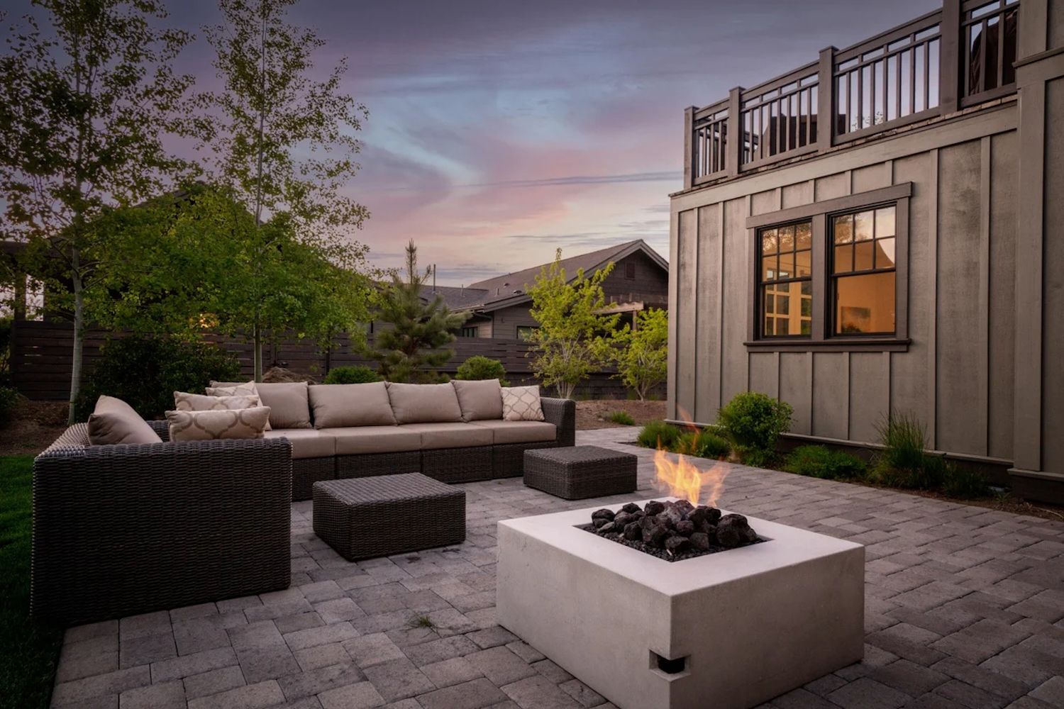Back Yard of Bend, OR Luxury Vacation Rental With Sofa and Fire Pit