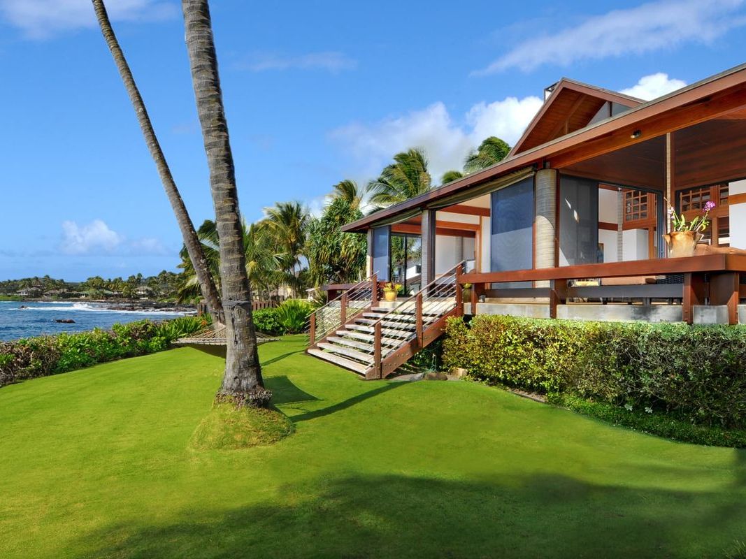 This quiet beach stretches along golden sand and gentle waves, backed by tall cliffs and open sky. It’s the kind of spot that feels untouched, perfect for long walks and peaceful days by the water.