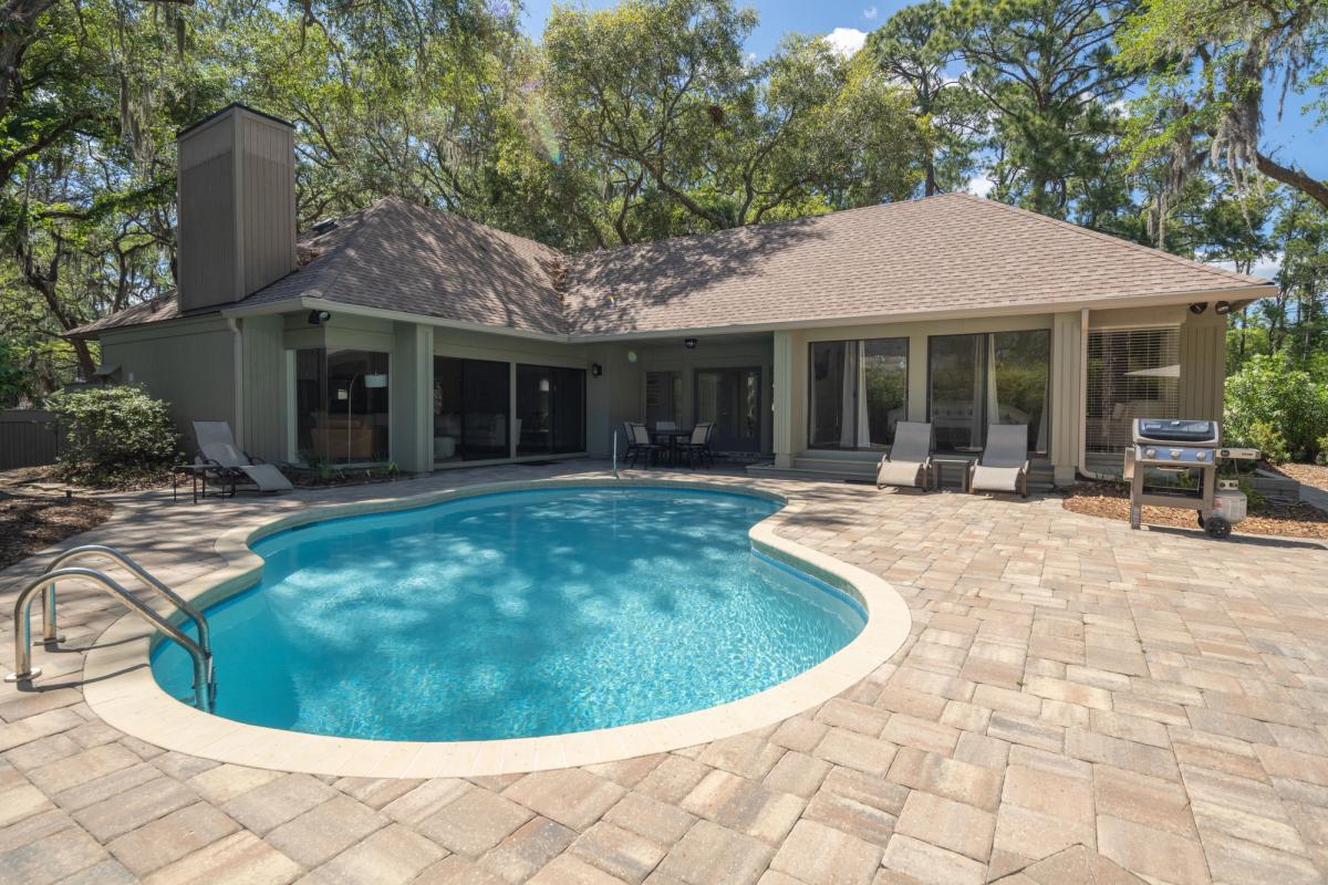 Exterior view of a Hilton Head Island vacation rental with a private pool.