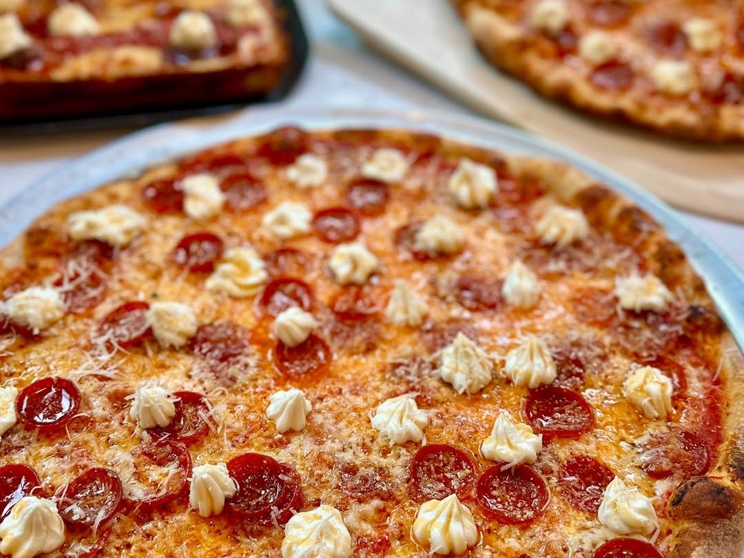 Large pepperoni pizza topped with dollops of creamy ricotta, baked to perfection with golden crust. A Telluride favorite known for hearty slices and bold flavor.