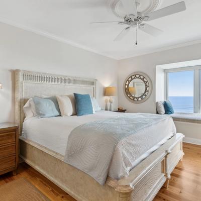 Primary bedroom with ocean view in 1867 Turtle Dunes.