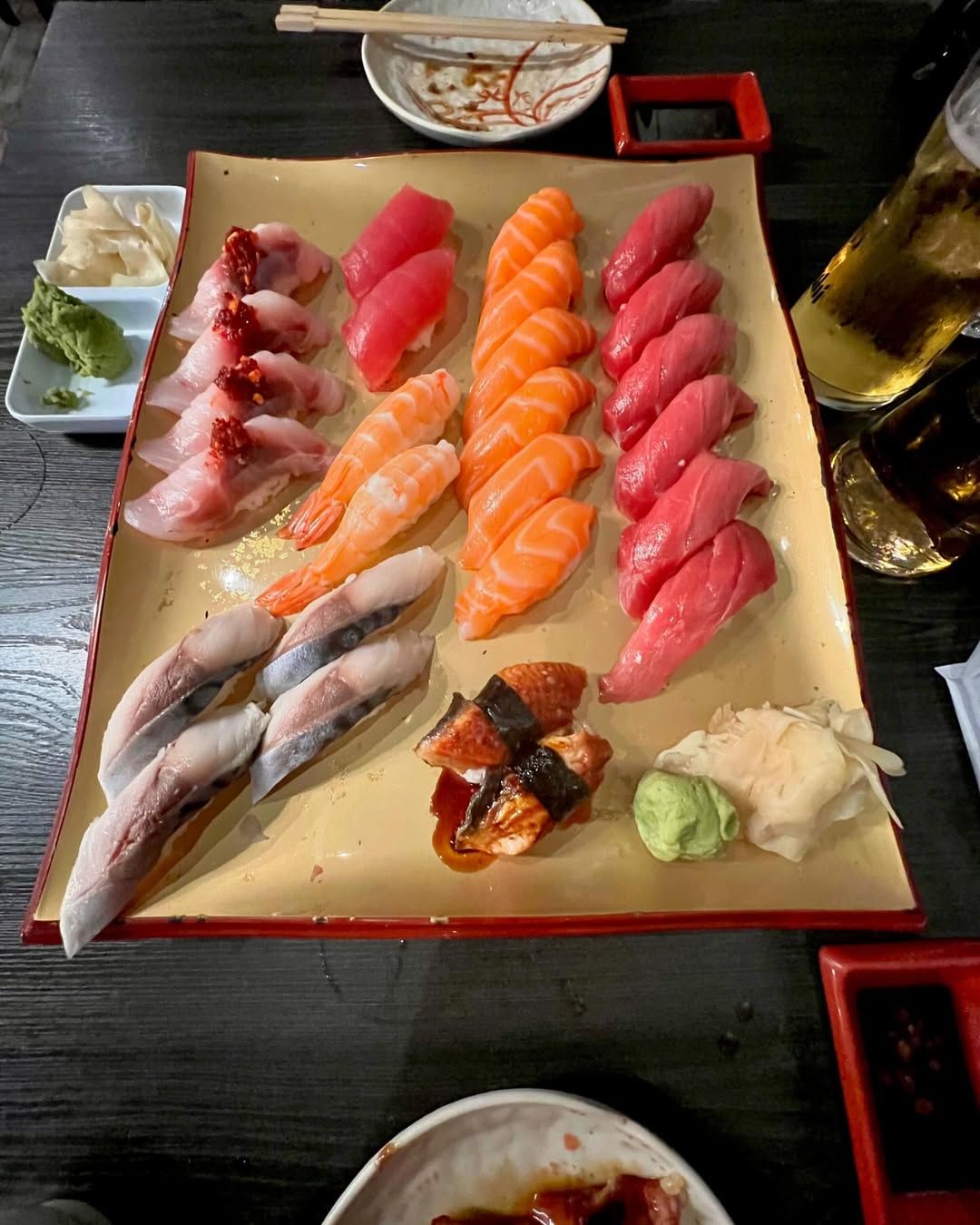 A fresh sushi platter at Hiro Sushi features salmon, tuna, and chef-selected nigiri. This Scottsdale sushi restaurant is loved for its quality fish and simple, traditional presentation.