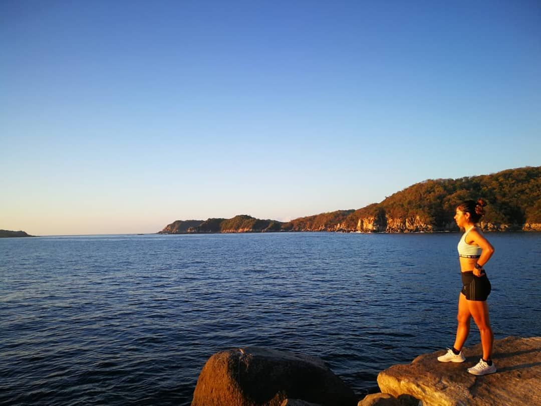 Playa Chahue is a lively beach in Huatulco where soft sand meets clear water. Visitors enjoy swimming, beach walks, and dining at nearby spots.