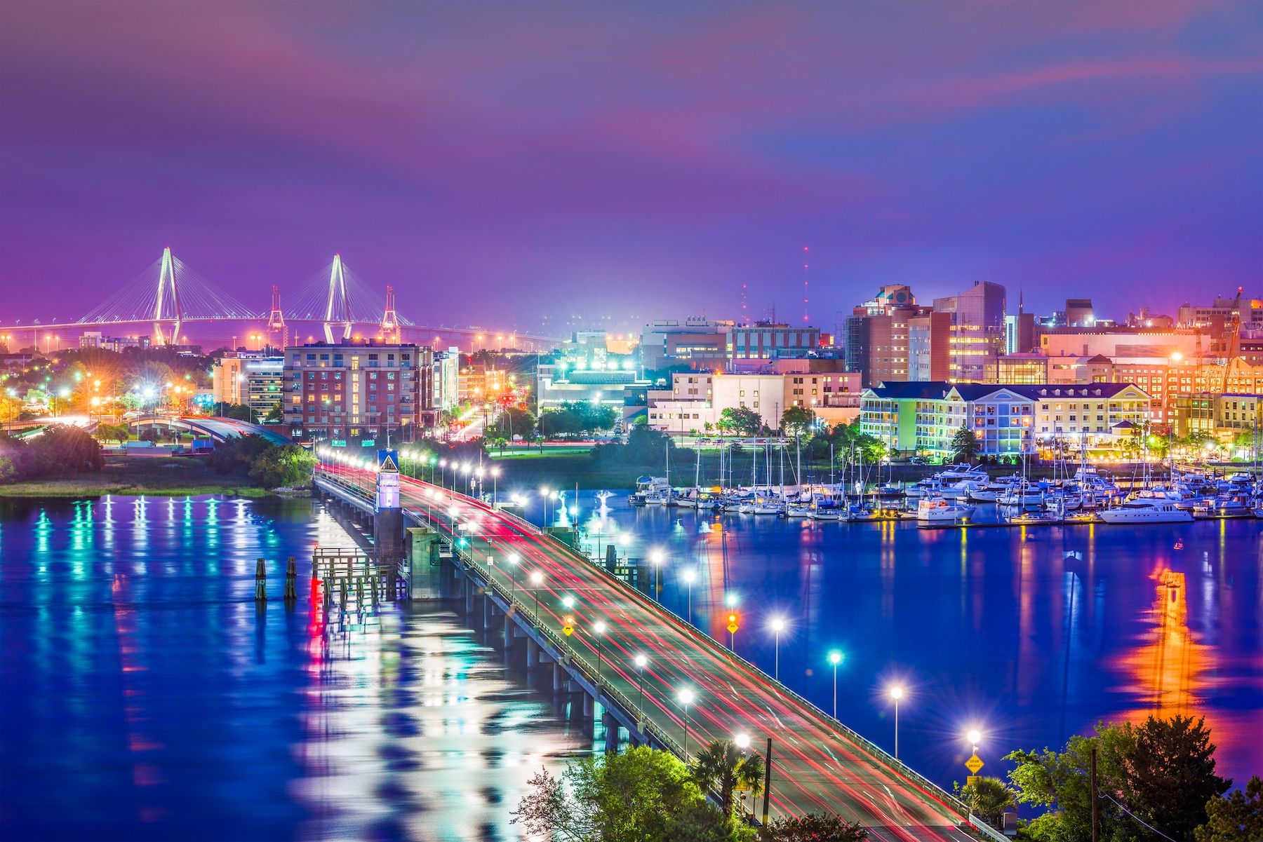 Charleston, South Carolina, USA skyline over the Ashley River with bright lights at night