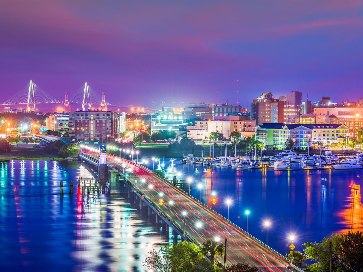 Charleston, South Carolina, USA skyline over the Ashley River with bright lights at night