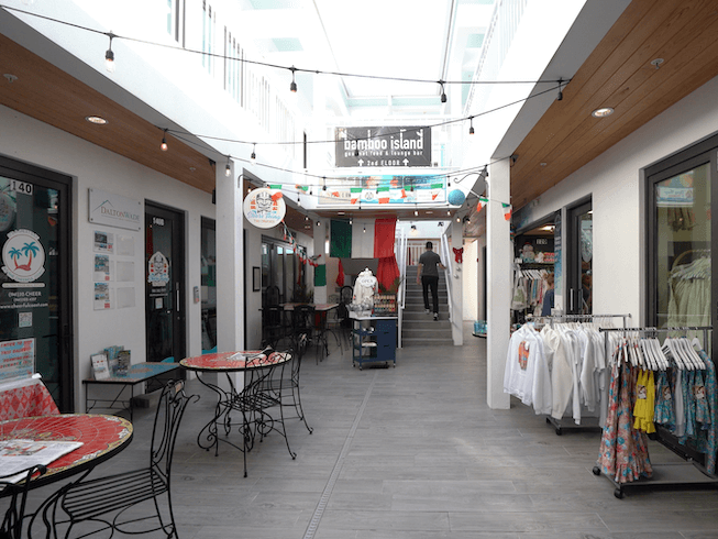 Bridge Street’s indoor shopping arcade featuring local crafts, boutique shops, and a cozy island atmosphere.