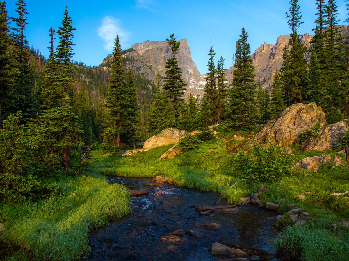 View of Rocky Mountain National Park River and Mountains in the Background
