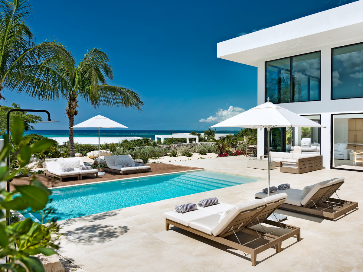 View of Private Pool and Lounge Chairs at Turks & Caicos Luxury Villa Rental