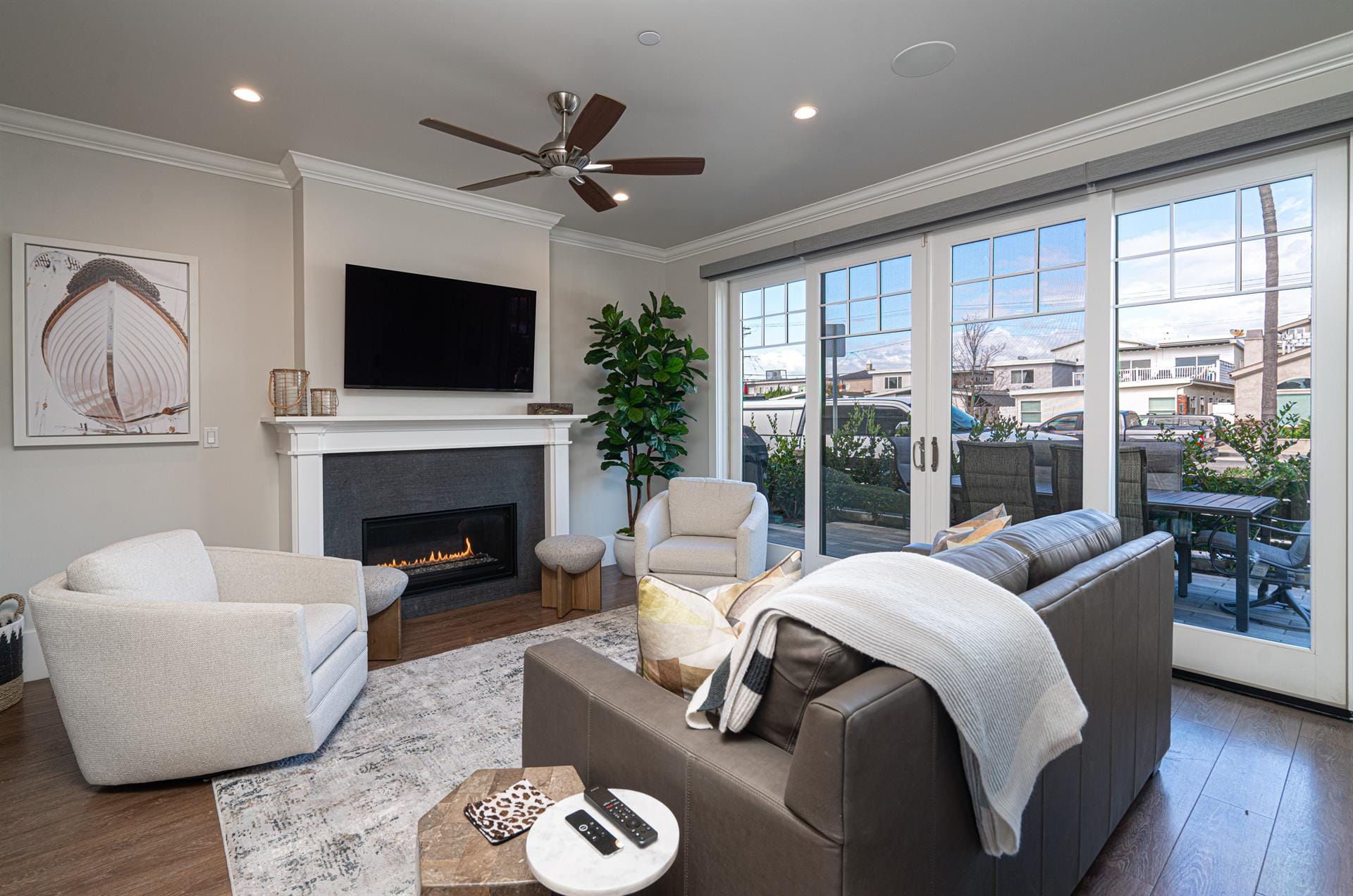 A rustic-chic beach house on the Outer Banks with cedar siding and a wraparound porch facing the ocean. The wide driveway and private beach access make this the perfect family retreat.