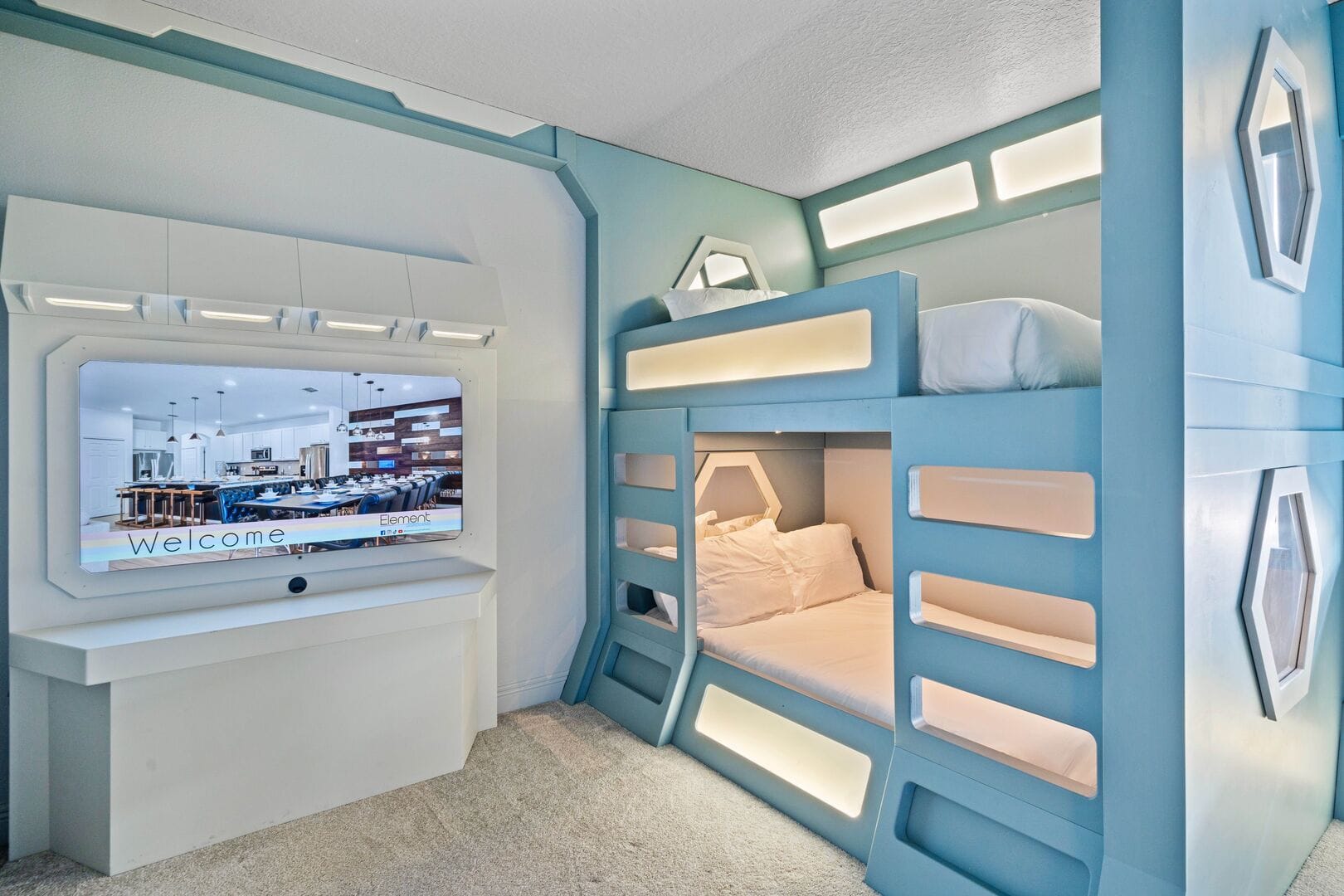 Futuristic-themed bedroom with bunk beds in vacation home