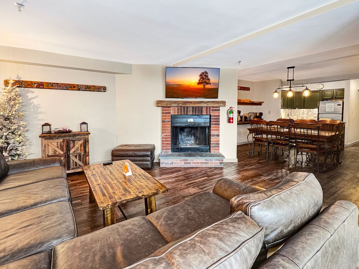 Living Room With Fireplace in Killington Walk-To-Lift Vacation Rental