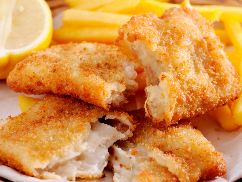 Golden crispy fish fillets served with a side of hot fries and fresh lemon wedges. A classic beachside meal that’s crunchy, satisfying, and perfect after a day in the sun.